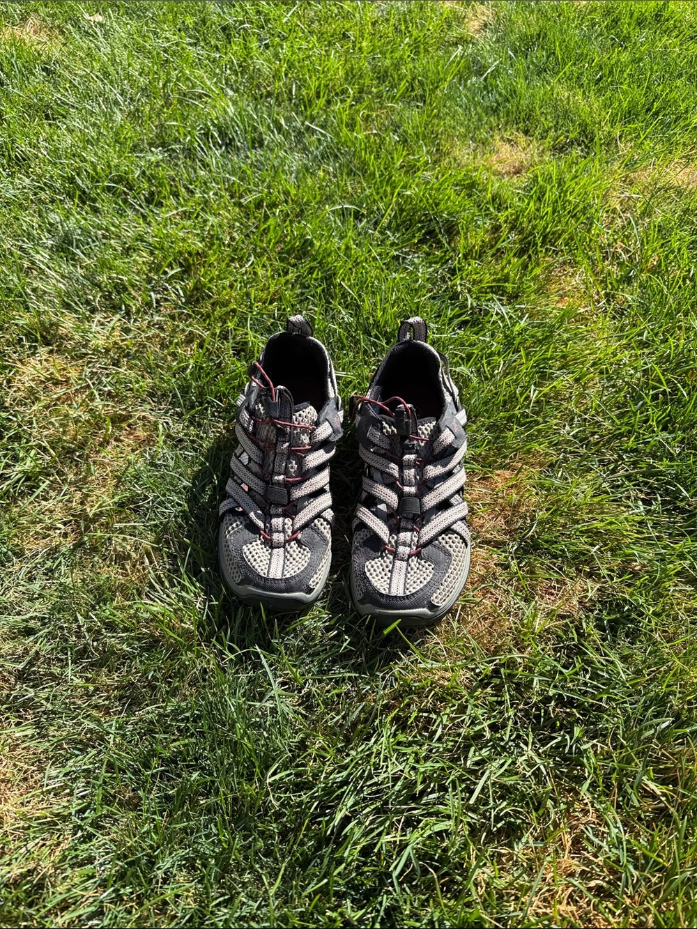 Chaco men’s Gray and Black Trail Sneakers with Red Accents
